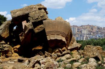 The Temple of Olympian Zeus, with Agrigento highrises in the distance — Valley of the Temples.